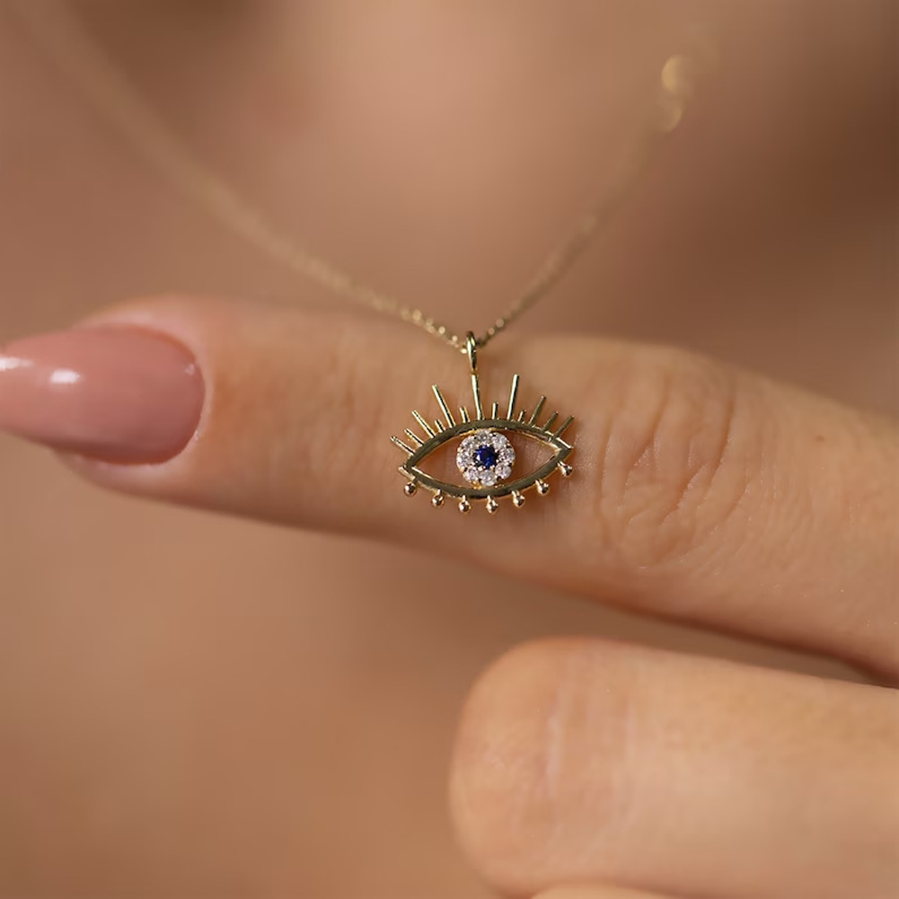 Demonic eyes with zircon gemstones, shiny pendant necklace display picture