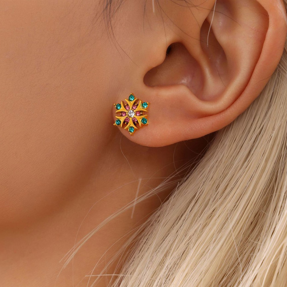Diamond-studded green snowflake earrings