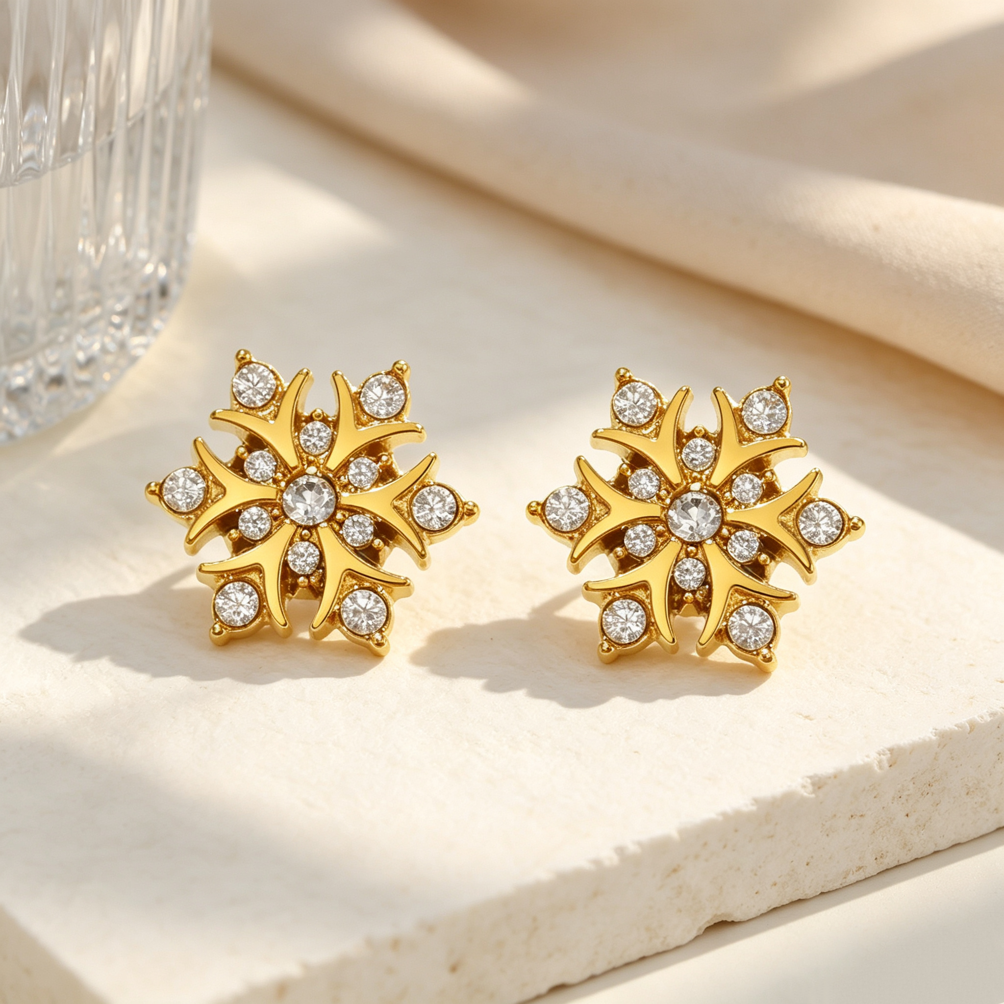 Diamond-studded snowflake earrings