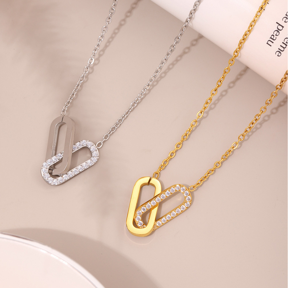 Rectangular clasp necklace set with zirconia stones